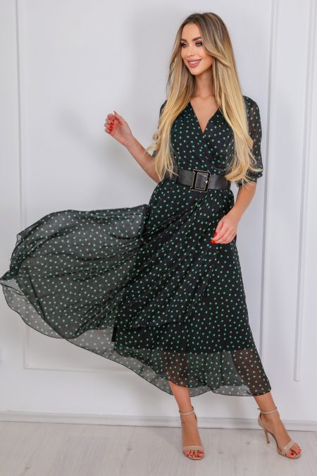 A fekete alapon zöld pöttyös KATIA elegáns pöttyös női maxi ruha elegáns és nőies megjelenéssel biztosítja viselőjének a magabiztos és nőies megjelenést.